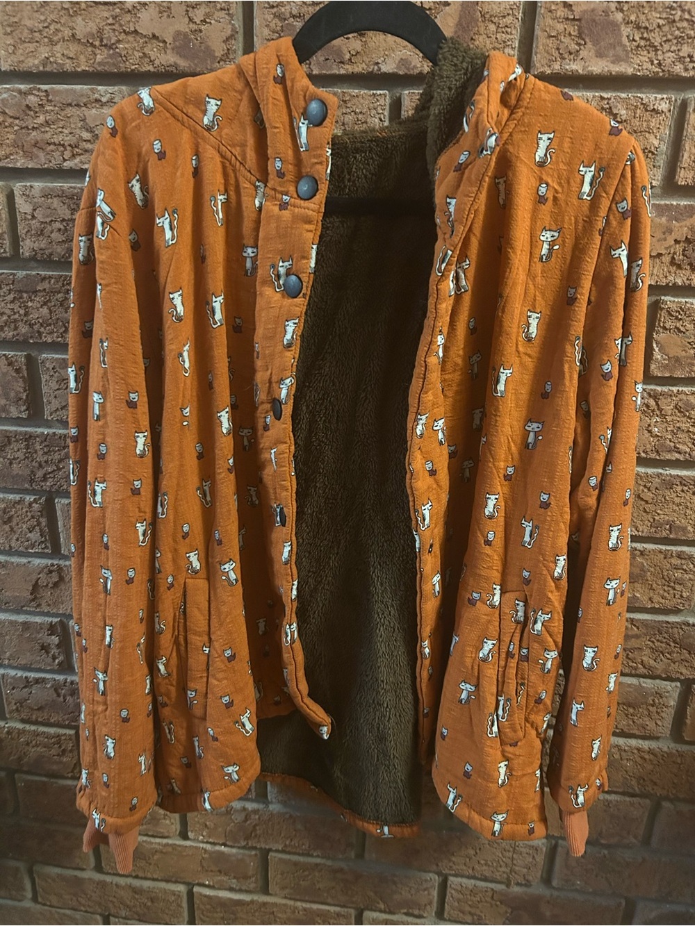 Women's Orange Quilted Fleece-Lined Jacket with Playful Print